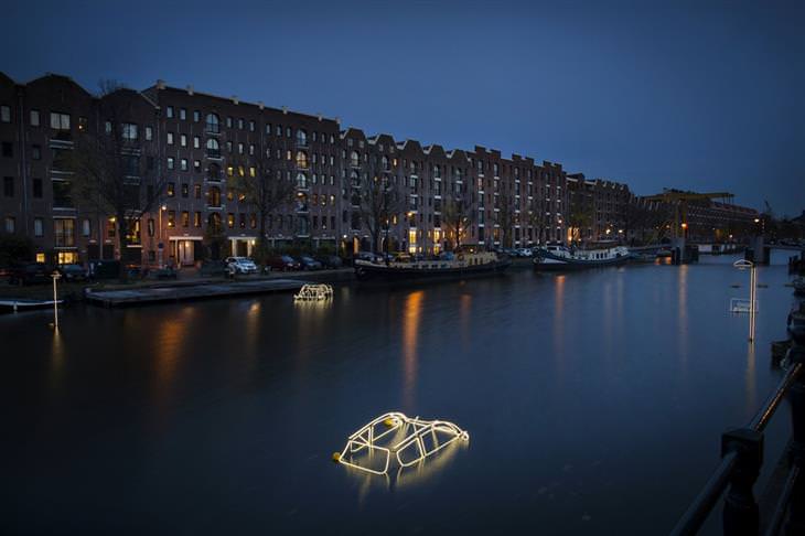 Festival de las luces de Amsterdam autos sobre el lago