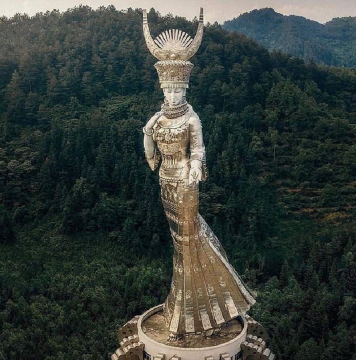 Beautiful artistic creations made by humankind and civilization over time, A statue of Miao diety, Yang’asha, in Guizhou, China, that is 288 feet tall