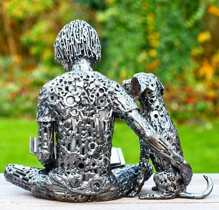 Magníficas Esculturas de Brian Mock niña con su perro