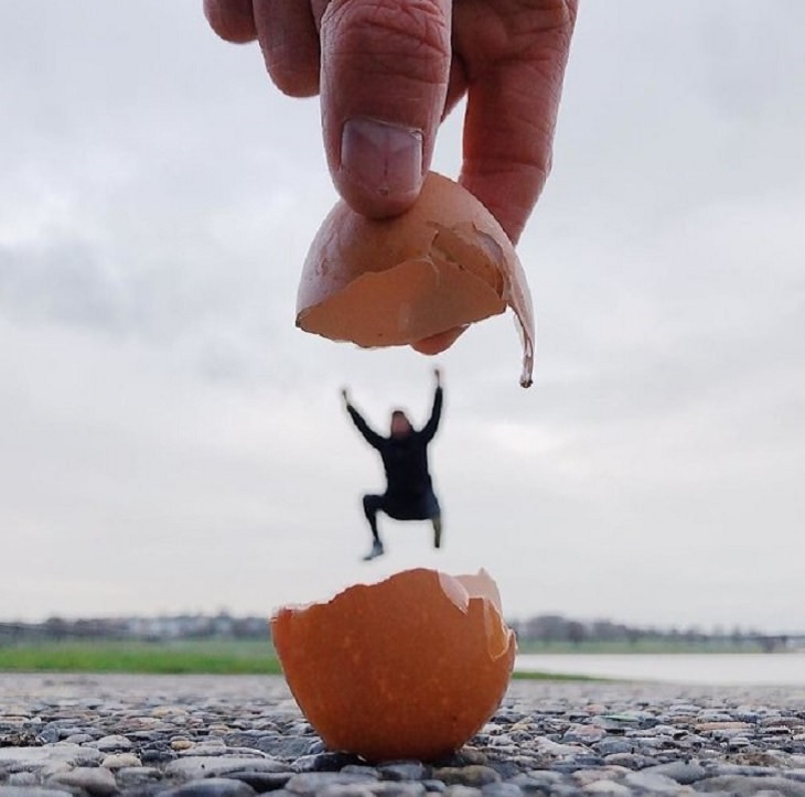 Imágenes De Ilusiones Ópticas De Tiago Silva hombre simulando salir de un cascarón de huevo