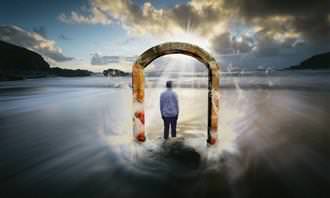 A man walks through sea gate
