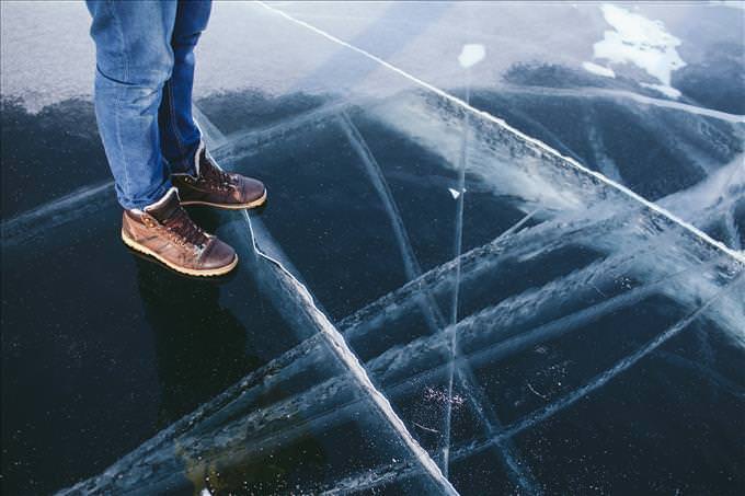 man standing on thin ice
