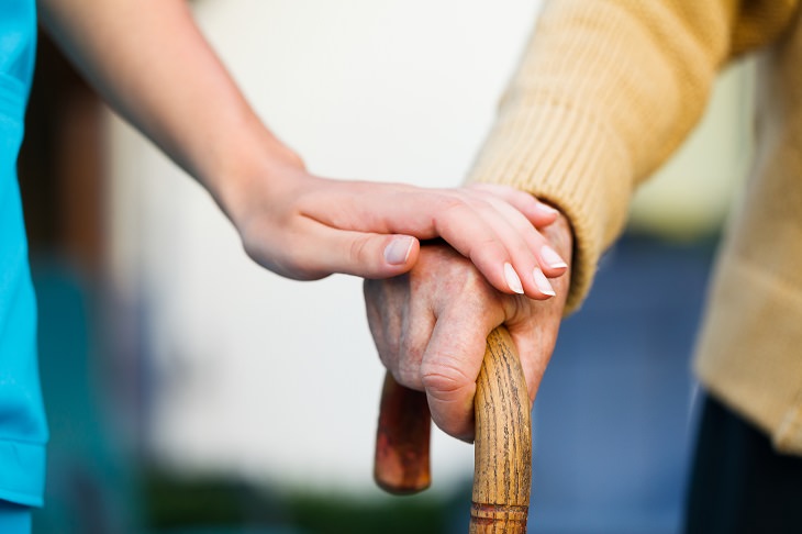 Alzheimer’s and Gingivitis study family member supporting senior