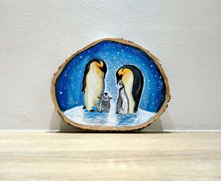 20 Hermosos Retratos De Animales Pintados En Madera pingüinos