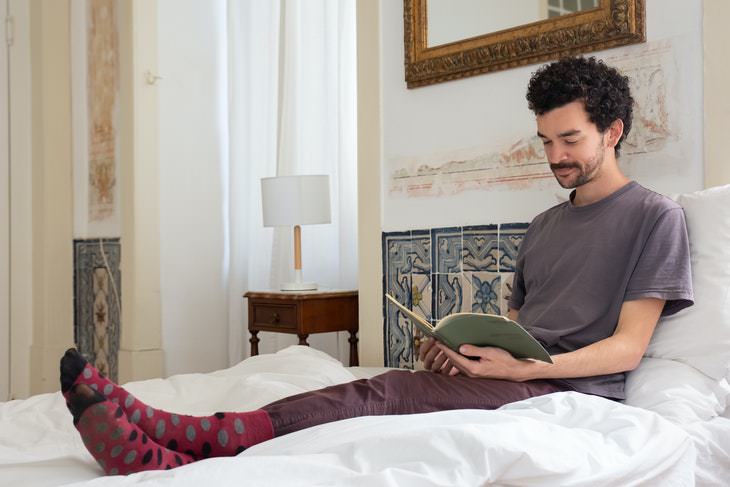 Foot Care Tips man in socks working at home