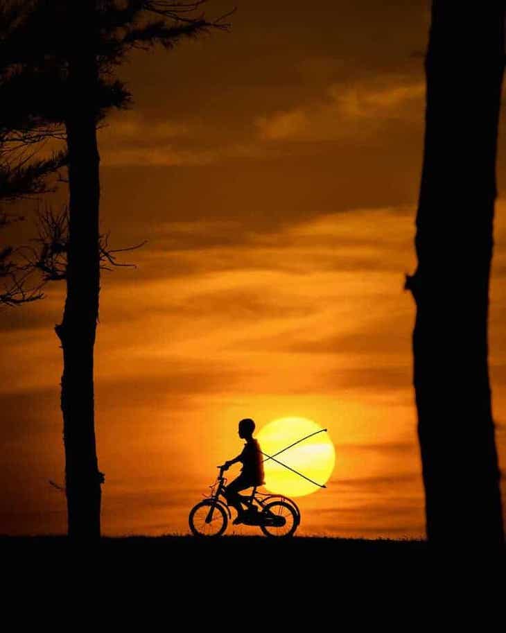 Whimsical Sunset Silhouette Photo by Krutik Thakur bike