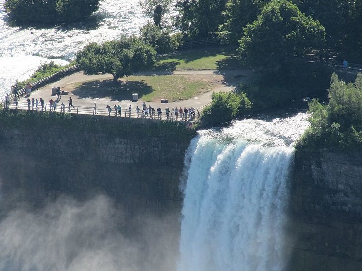 Sights, trails, cruises, activities, natural wonders and fun family events found at Niagara Falls between New York, United States and Ontario, Canada, Bridal Veil Falls, in Niagara Falls, New York, With Luna Island on the left