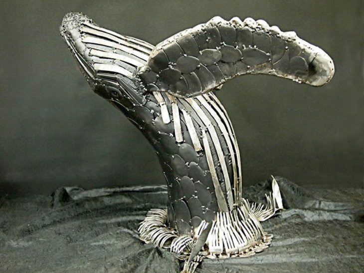 Sculptures welded and made using kitchenware, silverware and other utensils by Ohio Artist diagnosed with Parkinson’s Disease, Gary Hovey, Breaching Humpback Whale