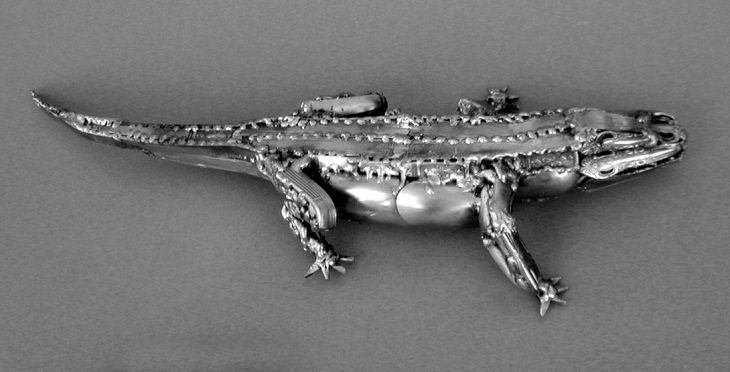 Sculptures welded and made using kitchenware, silverware and other utensils by Ohio Artist diagnosed with Parkinson’s Disease, Gary Hovey, Alligator