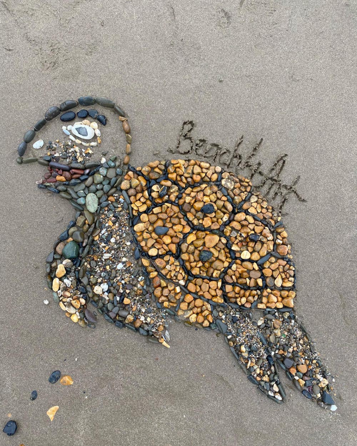 Arte De Playa, tortuga sonriendo