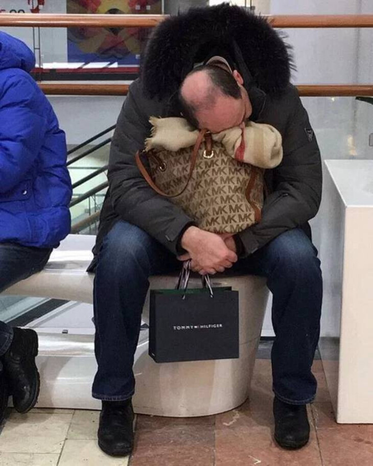 Hilarious Pics Of Men Stuck In Shopping Purgatory